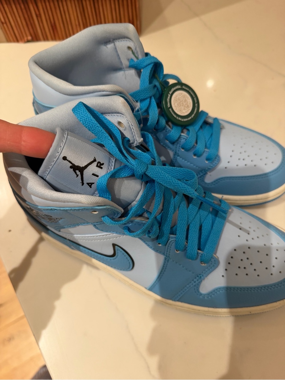 Nike Air Jordan 1 Mid Light Blue and Blue Athletic Sneakers